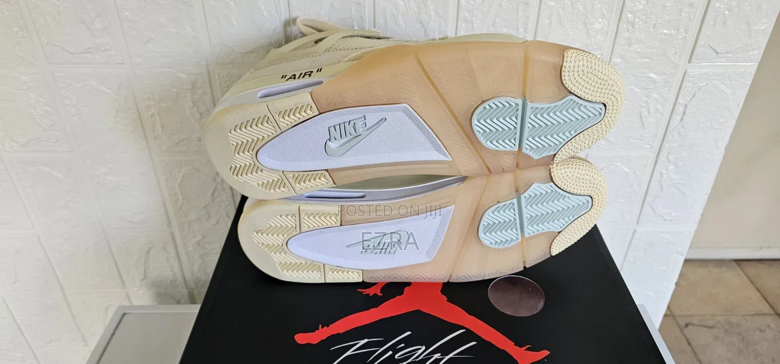 Air Jordan 4 Retro Off-White Sail.