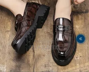 Luxe Crocodile-Embossed Chunky Penny Loafers.