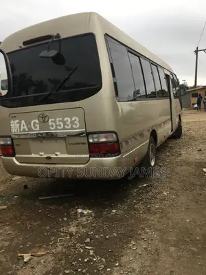 Toyota Coaster 2018 Gold