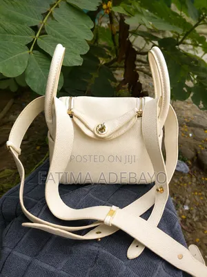 Brand New White Ladies Handbag With Gold Zipper