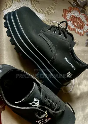 High Sole Naked Wolf Shoe
