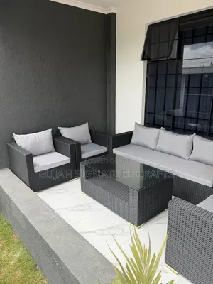 A Black Rattan Box Chair for Indoor and Outdoor Space