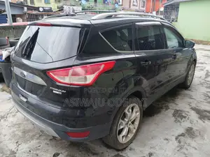 Ford Escape Titanium 4dr SUV (1.6L 4cyl Turbo 6A) 2014 Black