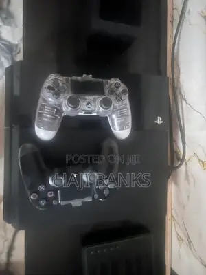 PS4 With 5 Games and Two Pads