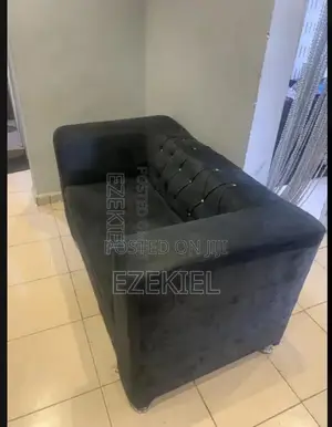 Neatly Used 2 Sitter Couch