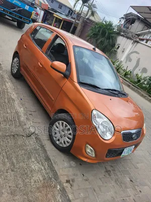 Kia Rio 2010 Gold