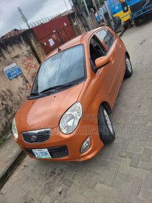 Kia Rio 2010 Gold