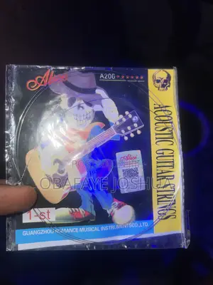 Guitar With Bag + Extra String
