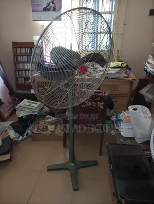 A Standing Fan Still Very Good and Working Properly and Fine
