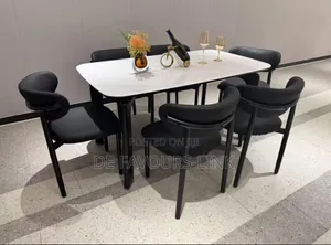 Black Chairs and Marble Dinning Table