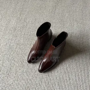 The Heeled Leather Lined Ankle Boot Available in Black and Brown Color