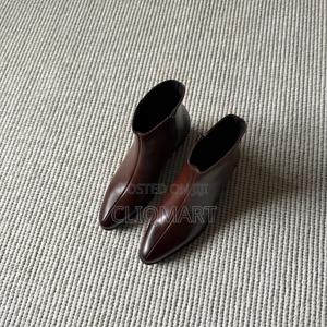 The Heeled Leather Lined Ankle Boot Available in Black and Brown Color