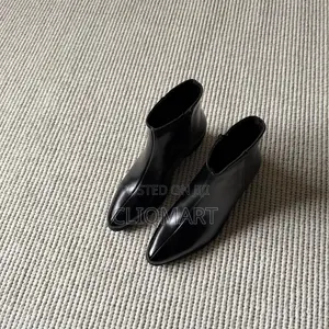 The Heeled Leather Lined Ankle Boot Available in Black and Brown Color