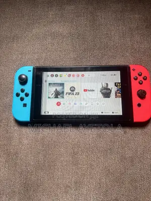 Nintendo Switch With Two Games Cartridge FIFA 23/ Assassin Creed