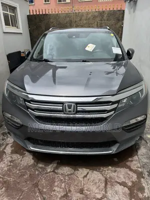 Honda Pilot Touring 4dr SUV 4WD (3.5L 6cyl 9A) 2016 Gray