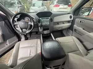 Honda Pilot Touring w/RES/Navi 4WD (3.5L 6cyl 5A) 2010 Blue