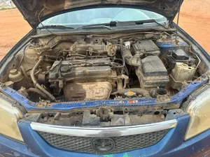 Mazda 323 2004 Blue
