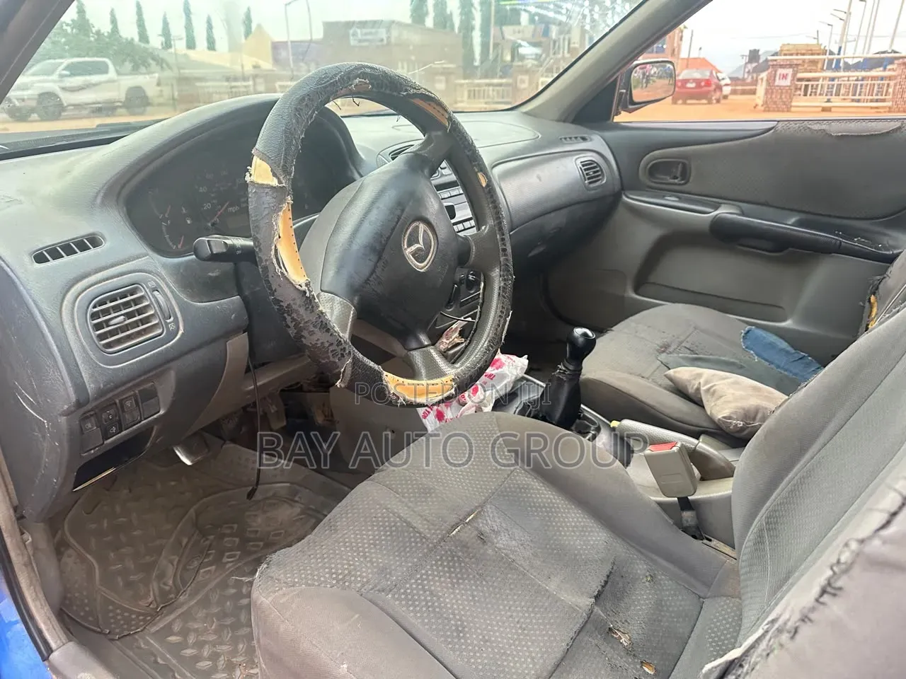 Mazda 323 2004 Blue