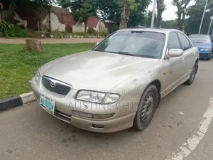 Mazda 626 ES V6 4dr Sedan (2.5L 6cyl 4A) 1999 Gold