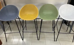 Modern Curved-Shell Molded Plastic Bar Stools a Minimalist Wire