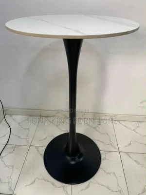 Round Bistro Bar Table Features a White Marble-Patterned Top Set