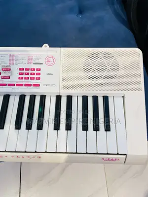 Casio LK-121 Key-Lighting Keyboard White 61 Keys With Adapter
