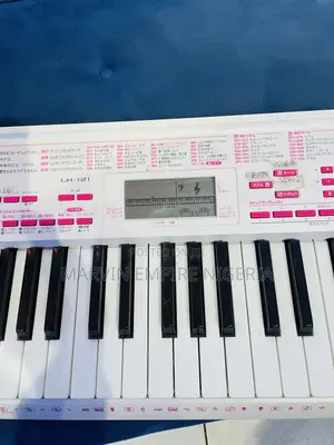 Casio LK-121 Key-Lighting Keyboard White 61 Keys With Adapter