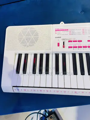 Casio LK-121 Key-Lighting Keyboard White 61 Keys With Adapter