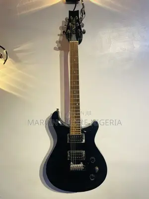 Black Double-Cutaway Jazz Electric Guitar With a Dual Humbucker Pickup