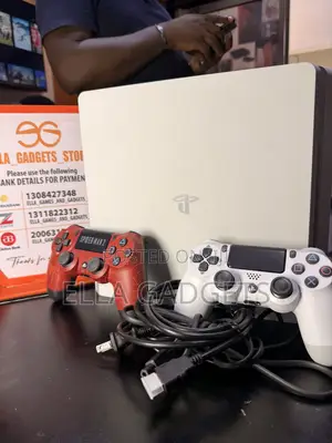 Clean Uk  Used Ps4 Slim With Games and 2 Pads