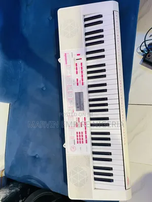 Casio LK-121 Key-Lighting Keyboard White 61 Keys With Adapter