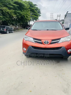 Toyota RAV4 LE 4dr SUV AWD (2.5L 4cyl 6A) 2015 Orange