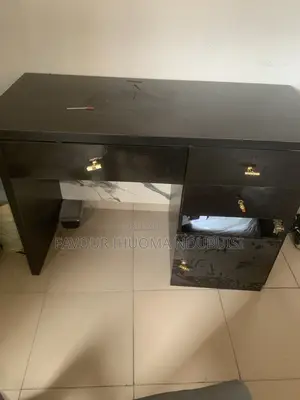 Neatly Used Reading Table and Chair