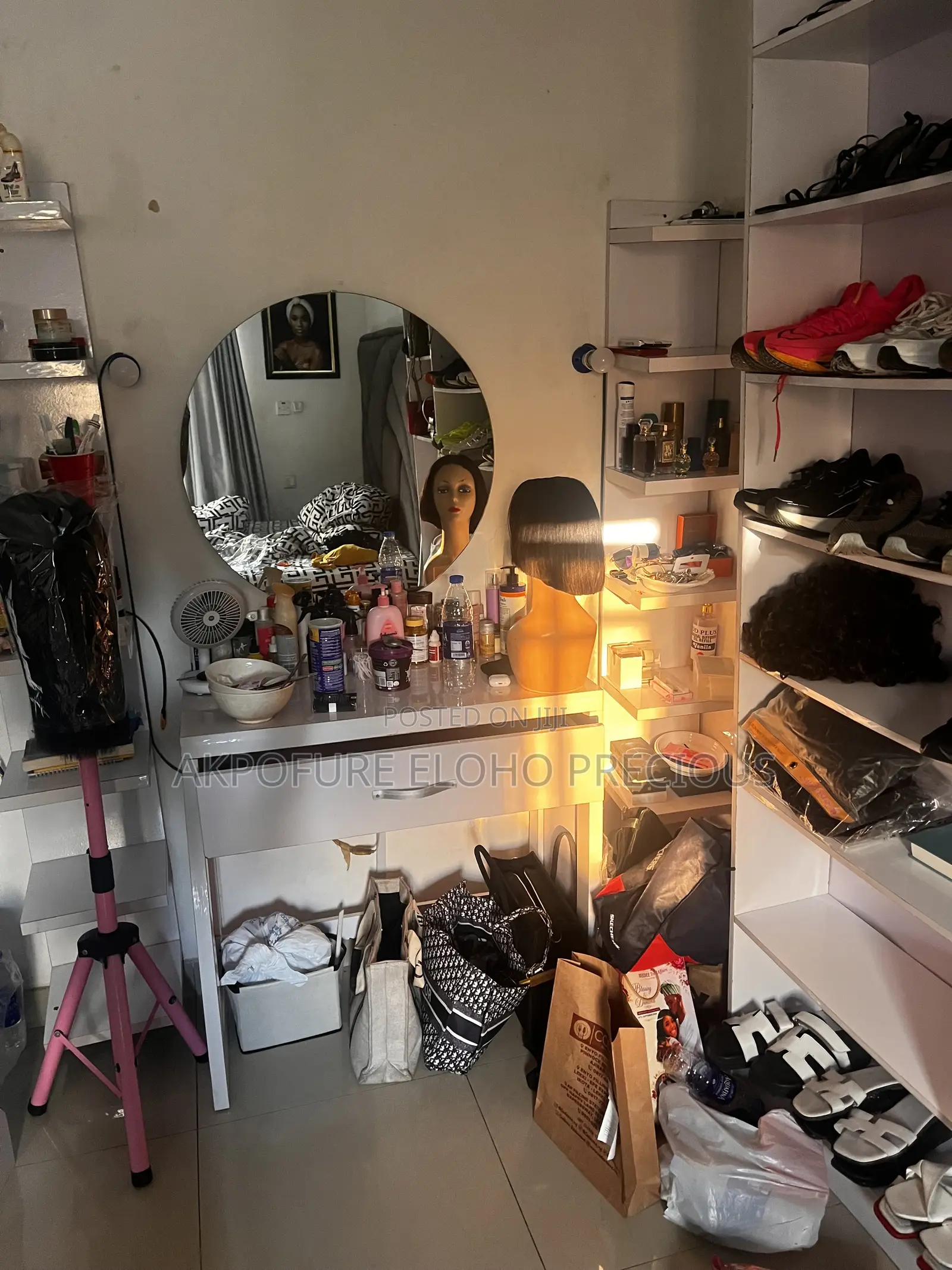 White Vanity Table With Two Rack by the Side and Mirror