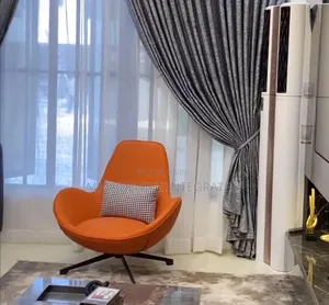 Modern Orange Swivel Lounge Chair