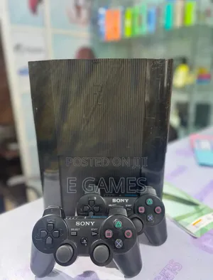 Playstation 3 Ps3 With Two Pads and Games Inside