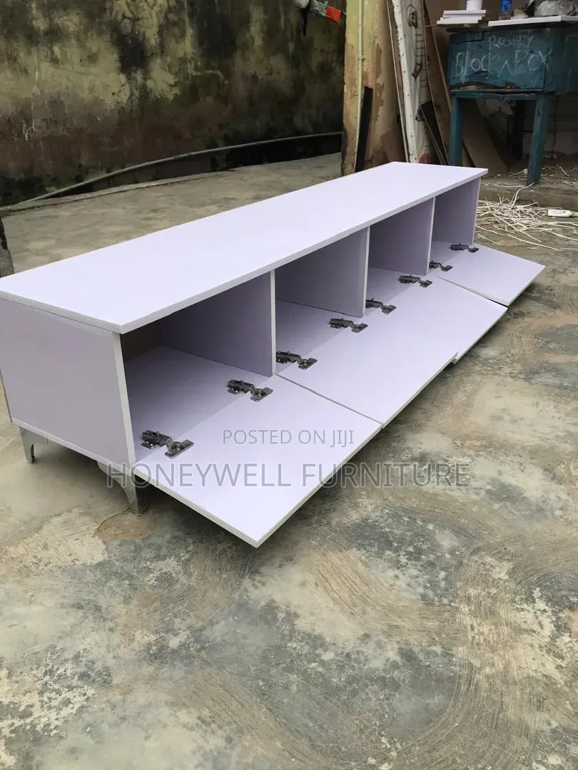 Brand New White TV Console With Four Doors