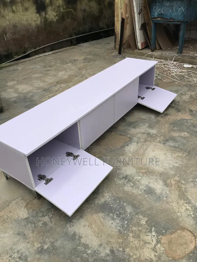 Brand New White TV Console With Four Doors