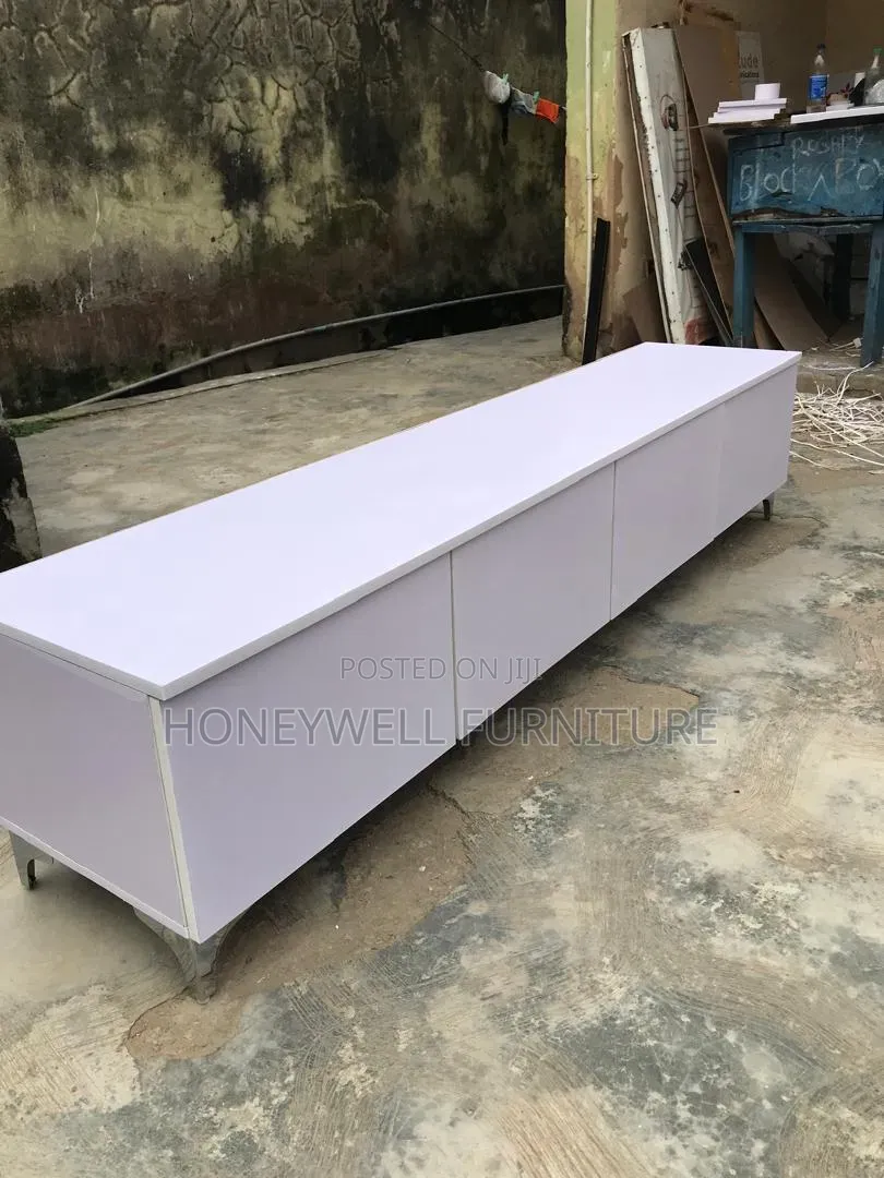 Brand New White TV Console With Four Doors