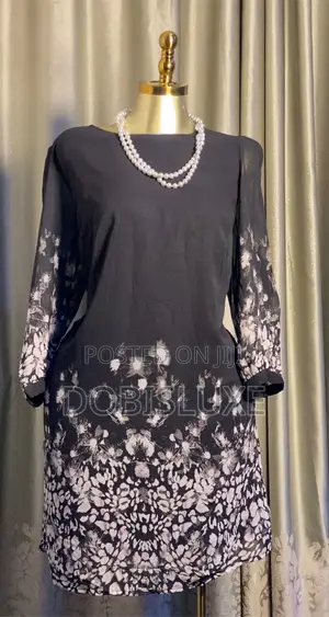 Neat Female Wears for Sale. Gowns, Tops, Skirts, Trousers.