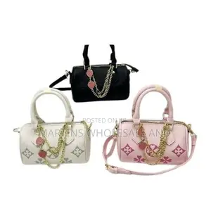 Stylish Faux-Leather Mini Barrel Handbags Feature a Distinctive