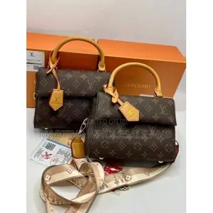 A Louis Vuitton Cluny Mini Handbag.