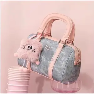 TOUTOU Denim Bowling Handbag Featuring Acid-Wash Fabric Accented With