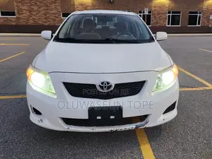 Toyota Corolla Base 4dr Sedan (1.8L 4cyl 5M) 2009 White