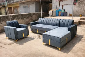 Gray Color L Shape Chair and a Single Seater
