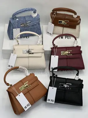 JW Pei Structured Top-Handle Handbags Feature a Distinctive Padlock-In
