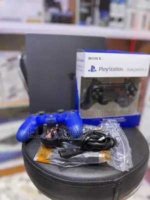 Direct Uk Used Ps4 Slim With Games and 2 Pads