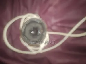 A Rusted Speaker That Have a Fuse and USB Wire