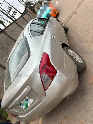 Nissan Almera 2012 Silver
