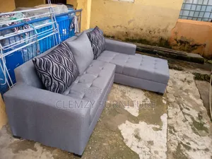 Gray L Shape Sofas and Pillows